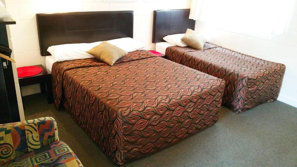 Postel nebo postele na pokoji v ubytování A&A Lodge Motel