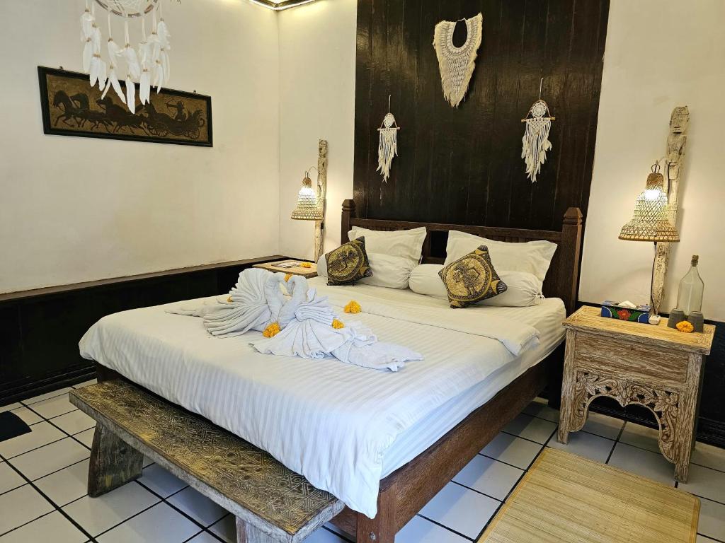 Postel nebo postele na pokoji v ubytování Binaria Museum Hotel