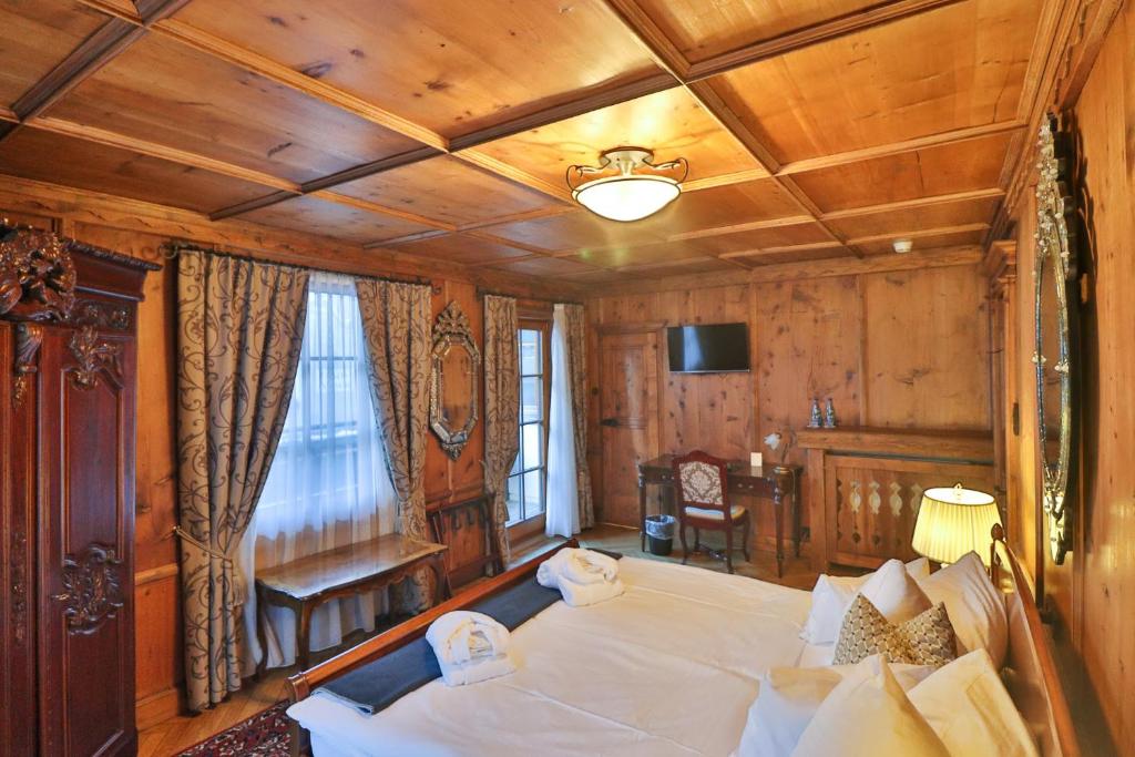 Postel nebo postele na pokoji v ubytování Schneider Hof Boutique-Hotel Garni Superior