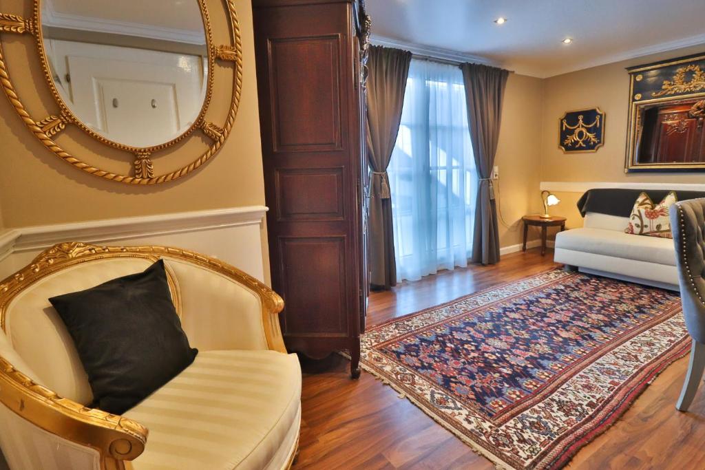 Posezení v ubytování Schneider Hof Boutique-Hotel Garni Superior
