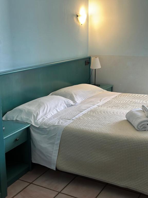 Postel nebo postele na pokoji v ubytování Hotel C0C00N Garden
