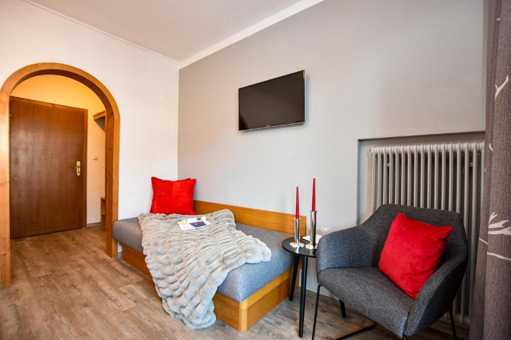 Postel nebo postele na pokoji v ubytování Hotel-Garni Austria