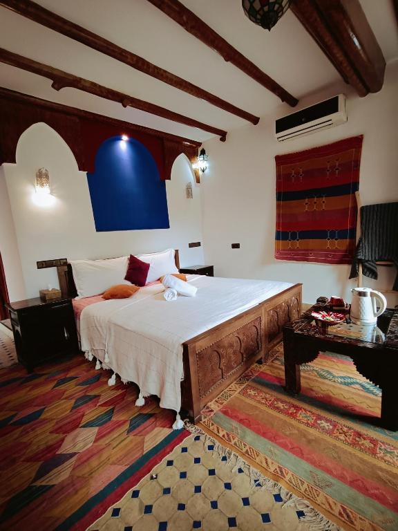Postel nebo postele na pokoji v ubytování Riad Atlas Toubkal