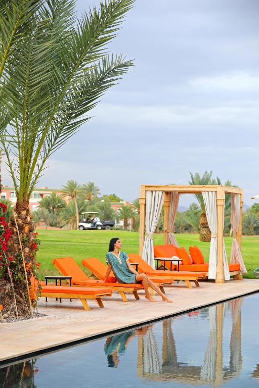 Bazén v ubytování Pavillon du Golf -Palmeraie suites nebo v jeho okolí