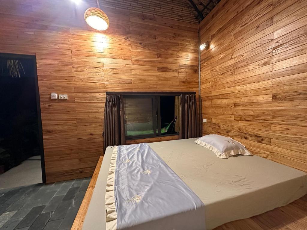 Postel nebo postele na pokoji v ubytování Hi Bungalow