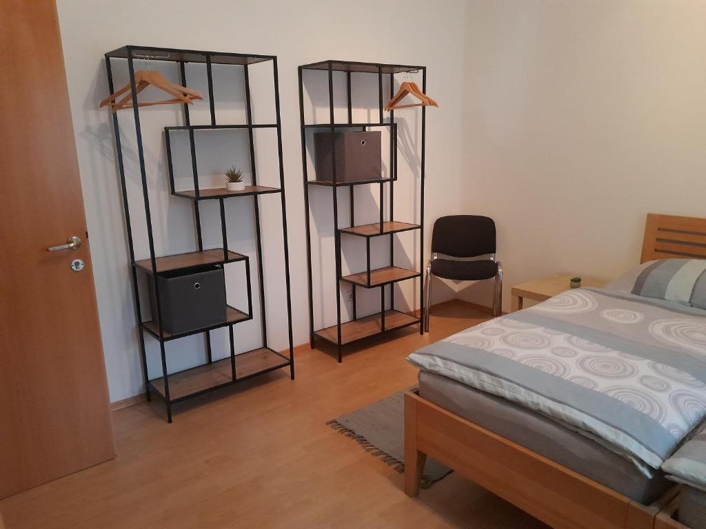 Postel nebo postele na pokoji v ubytování Ferienwohnung Moorblick