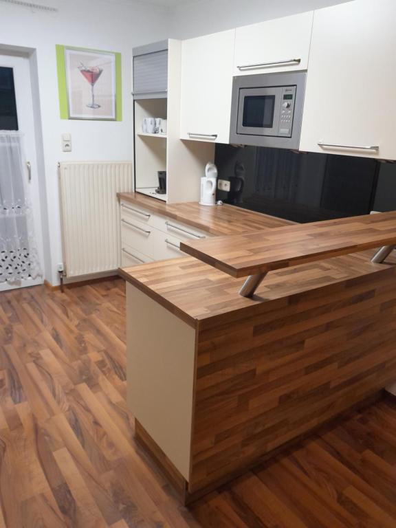 Kuchyň nebo kuchyňský kout v ubytování Ferienwohnung Moorblick