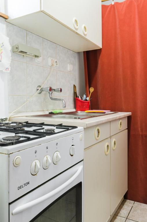 Kuchyň nebo kuchyňský kout v ubytování Família Panzió