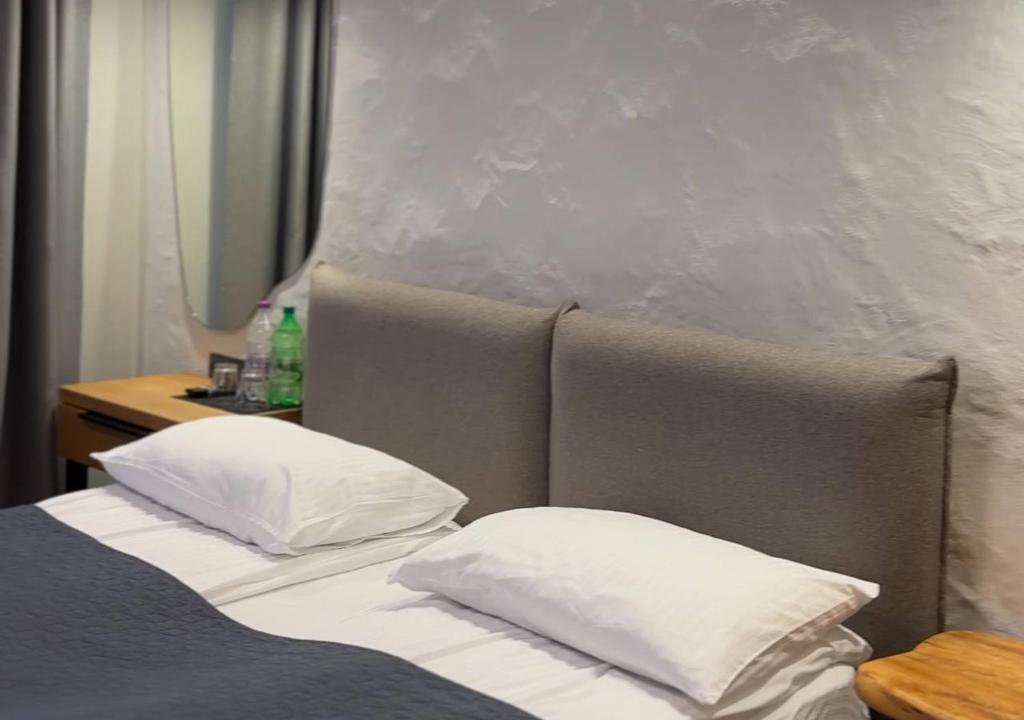 Postel nebo postele na pokoji v ubytování Котеджі Грань