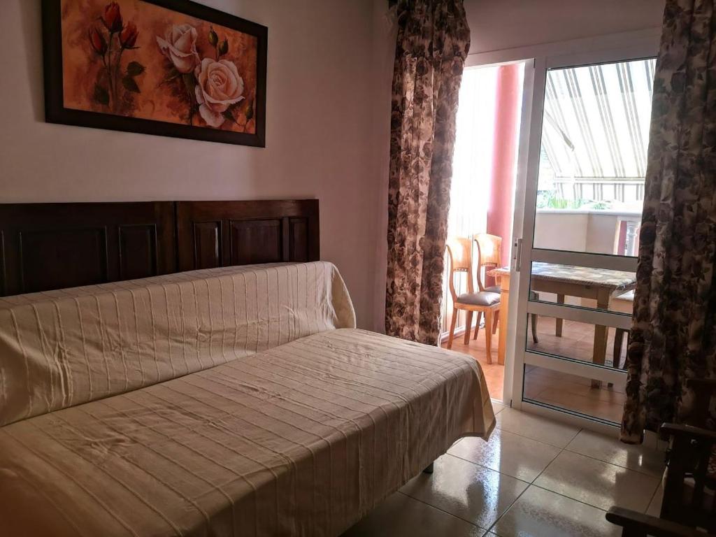 Postel nebo postele na pokoji v ubytování Callao Beach 4