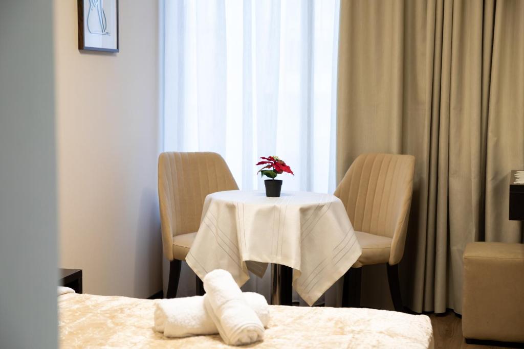 Posezení v ubytování Guest House Shtaka