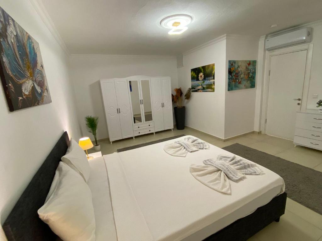 A bed or beds in a room at Bodrum eaSon Villa & House 350m2 Full Sea View with Private Infinity Pool