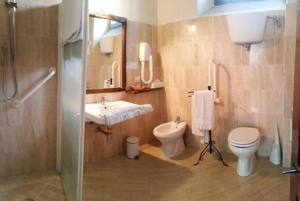 Koupelna v ubytování Agriturismo Podere Alberese