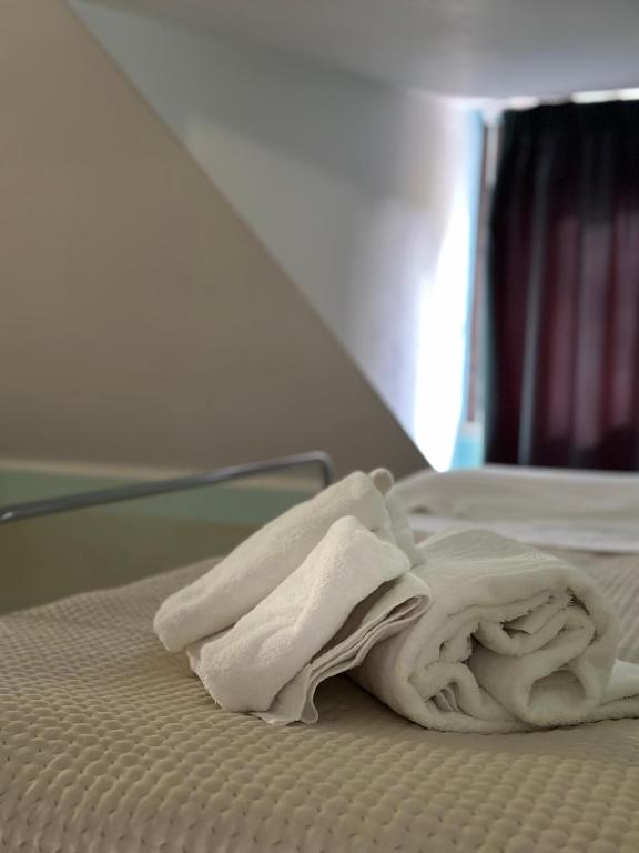 Postel nebo postele na pokoji v ubytování Hotel C0C00N Garden