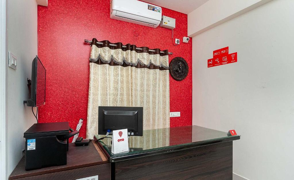 TV a/nebo společenská místnost v ubytování Hotel O Lakshmi Residency