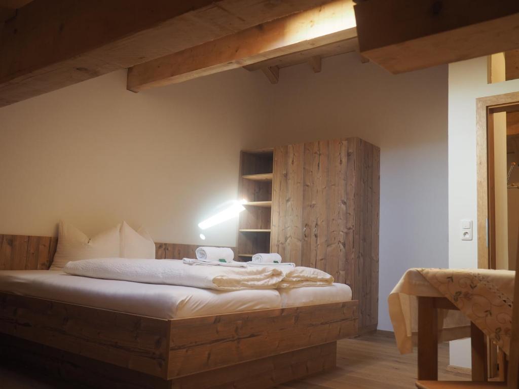 Postel nebo postele na pokoji v ubytování Bergerhof Fontanella