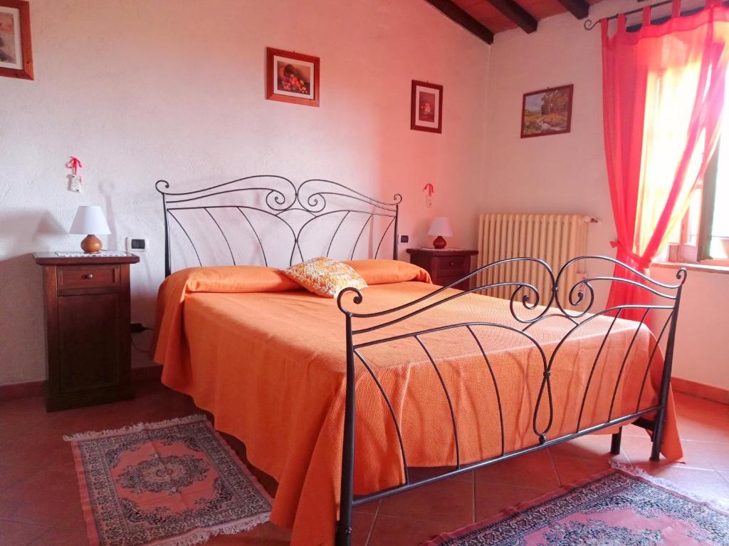 Posteľ alebo postele v izbe v ubytovaní Agriturismo la Coccinella