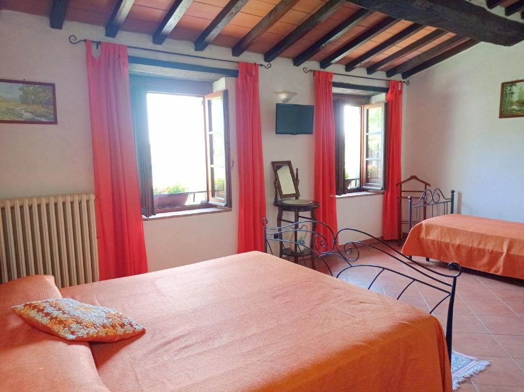 Posteľ alebo postele v izbe v ubytovaní Agriturismo la Coccinella