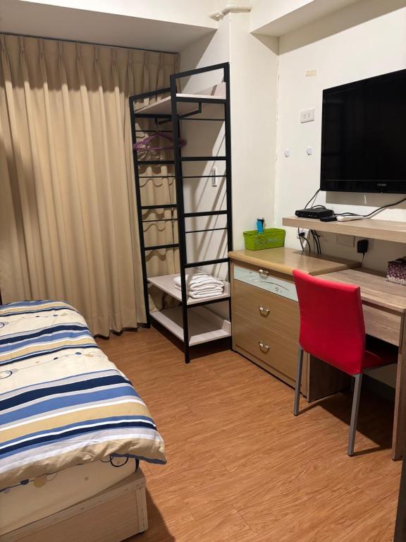 Postel nebo postele na pokoji v ubytování 果芒驛站旅店
