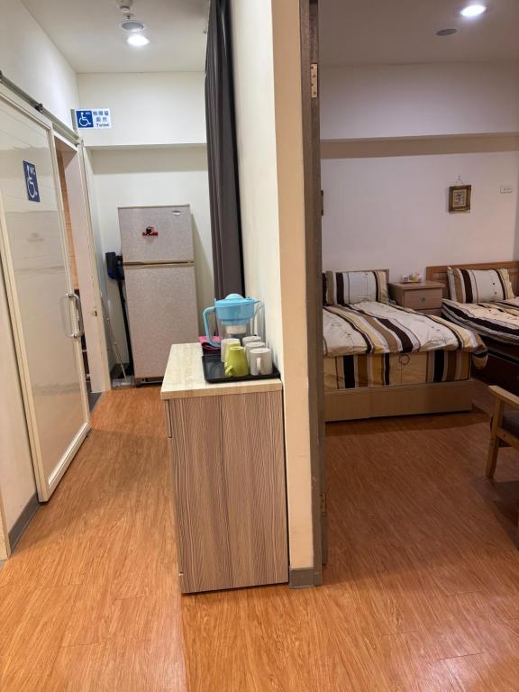 Kuchyň nebo kuchyňský kout v ubytování 果芒驛站旅店