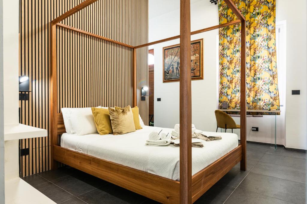 Postel nebo postele na pokoji v ubytování Luxury B&b Euphorbia