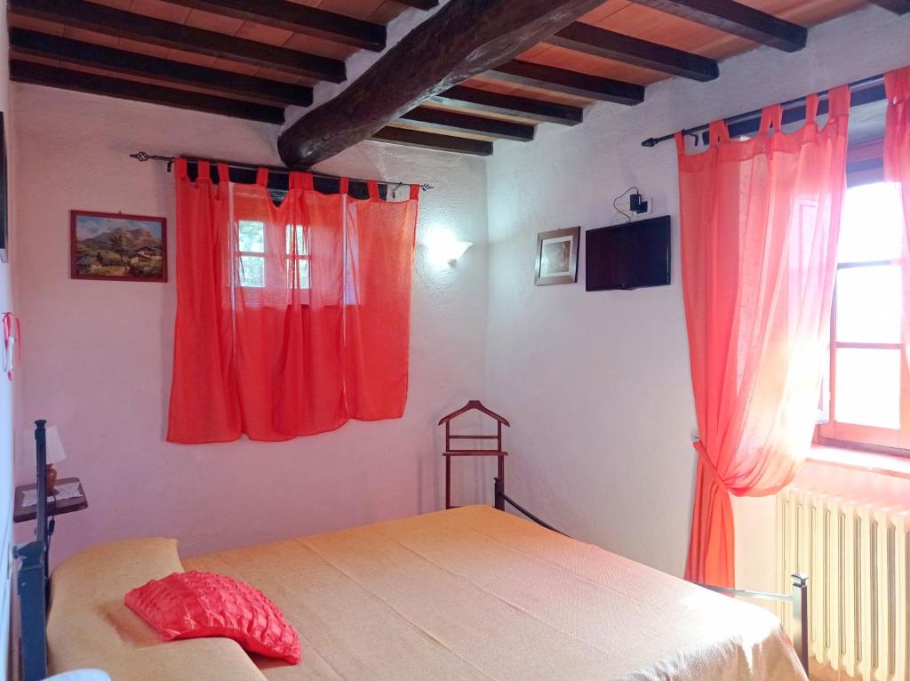Posteľ alebo postele v izbe v ubytovaní Agriturismo la Coccinella