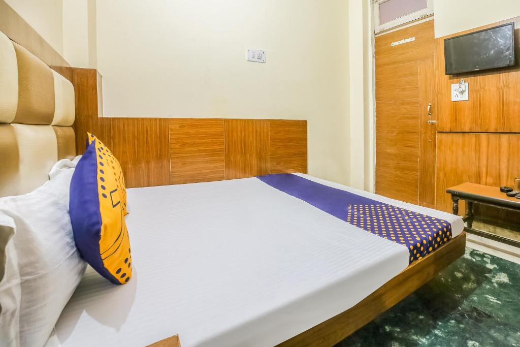 Postel nebo postele na pokoji v ubytování Hotel Silver Palace