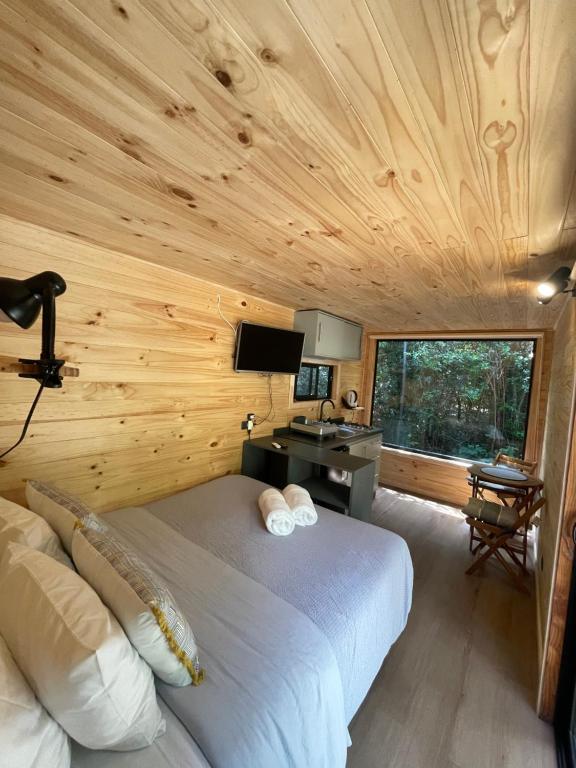TV a/nebo společenská místnost v ubytování Pucura Eco Lodge