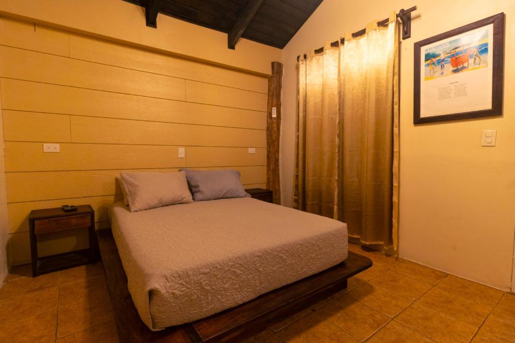 Postel nebo postele na pokoji v ubytování Cabinas La Fulanita
