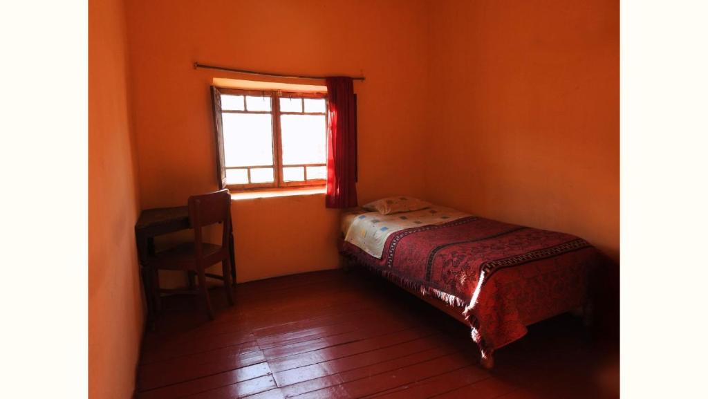 Llit o llits en una habitació de Hospedaje Estrellita