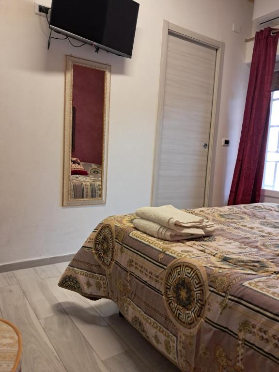 Postel nebo postele na pokoji v ubytování levante rooms