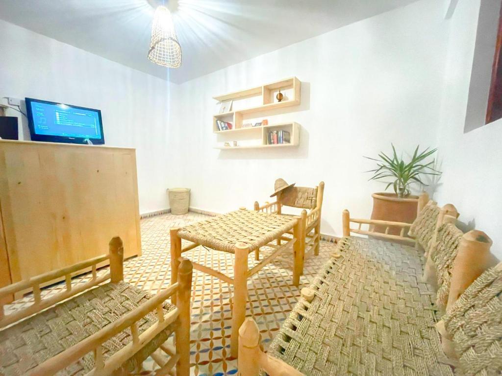 TV a/nebo společenská místnost v ubytování Eco Bay Surf House