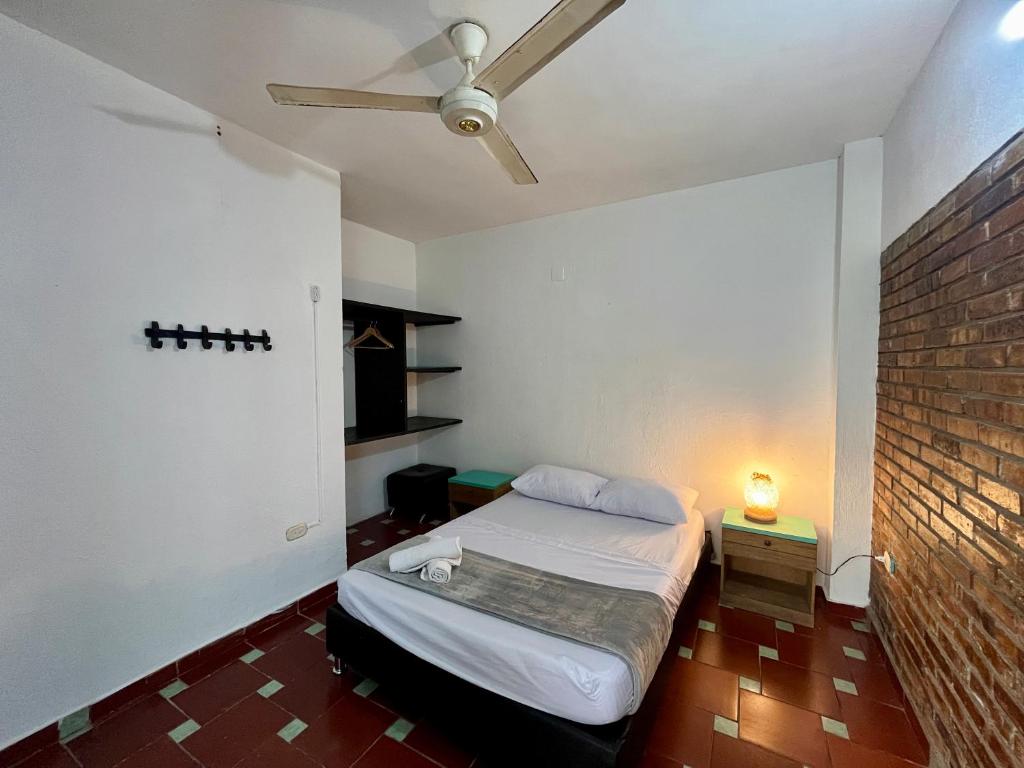 Postel nebo postele na pokoji v ubytování Sana Mar Hostel & Eco-Café