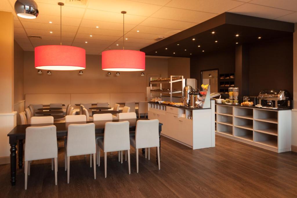 Kuchyň nebo kuchyňský kout v ubytování Hotel Expo