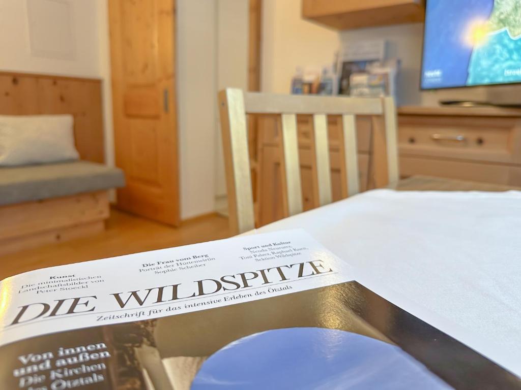 TV a/nebo společenská místnost v ubytování Appart Loreen