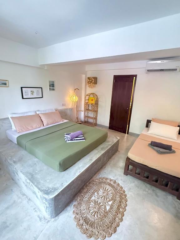 Postel nebo postele na pokoji v ubytování Sri Lanka Surf Villa Domus Graziella