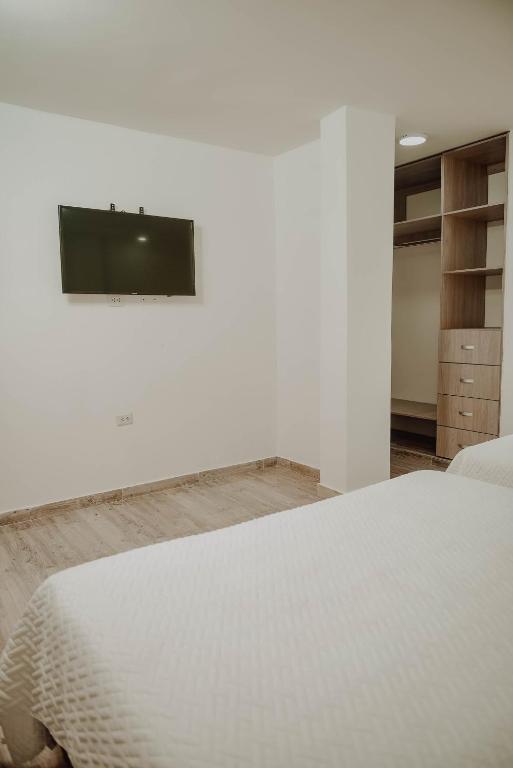Postel nebo postele na pokoji v ubytování Deluxe