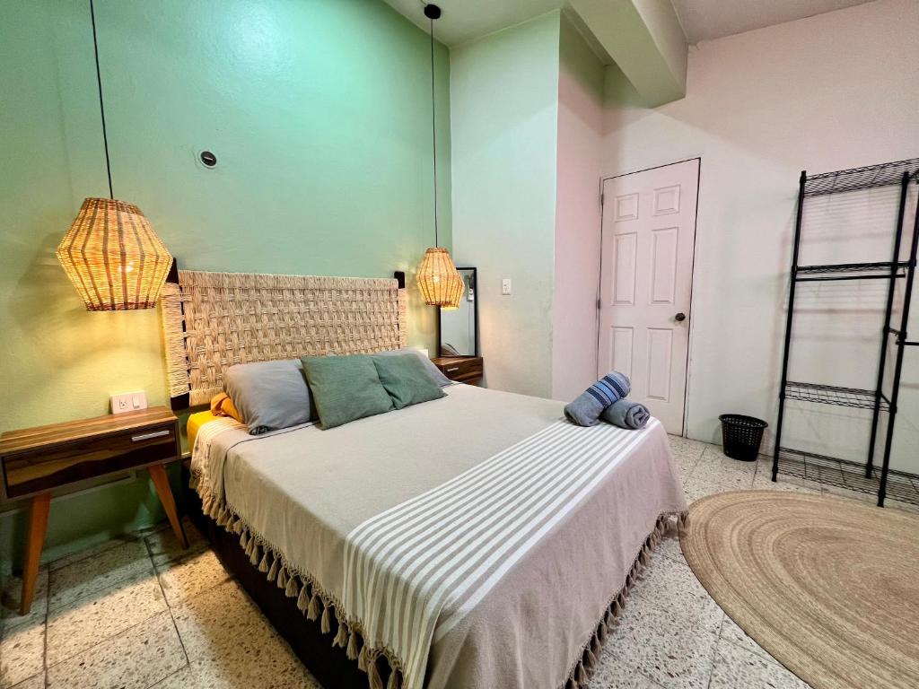 Letto o letti in una camera di Hostal Central Oaxaca