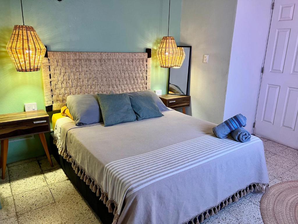 Letto o letti in una camera di Hostal Central Oaxaca