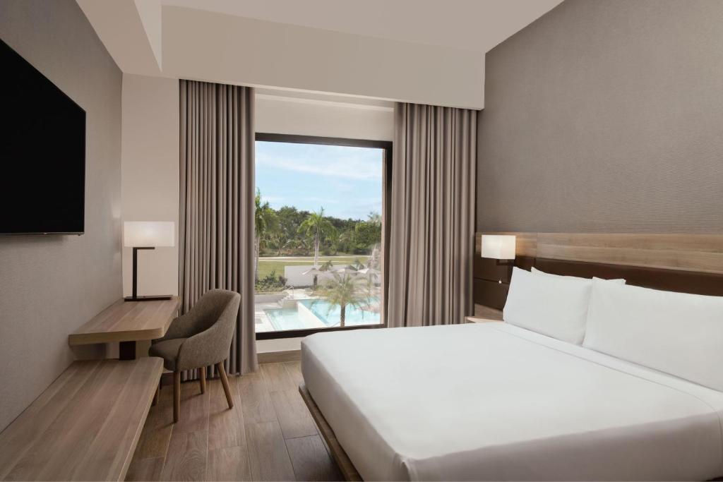 Postel nebo postele na pokoji v ubytování AC Hotel by Marriott Punta Cana
