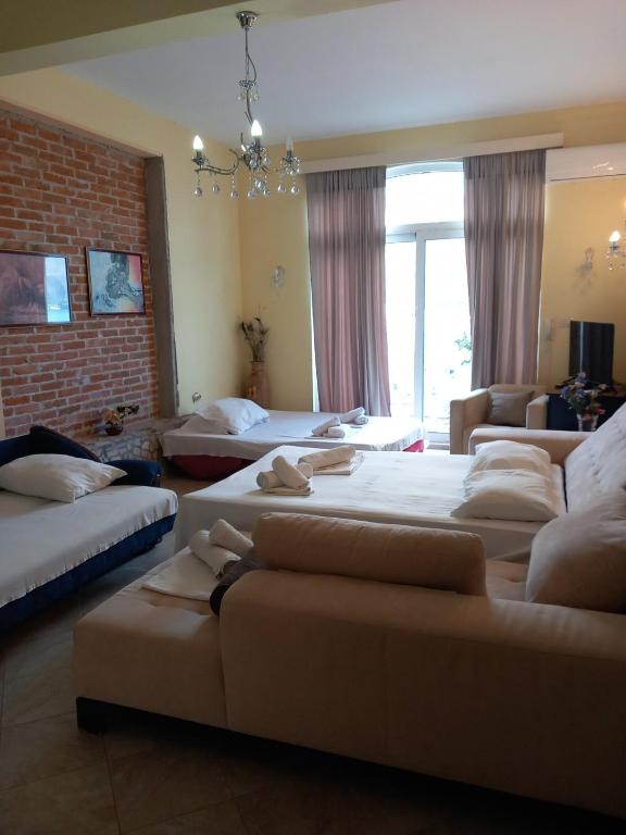 Postel nebo postele na pokoji v ubytování White Hills Apartments