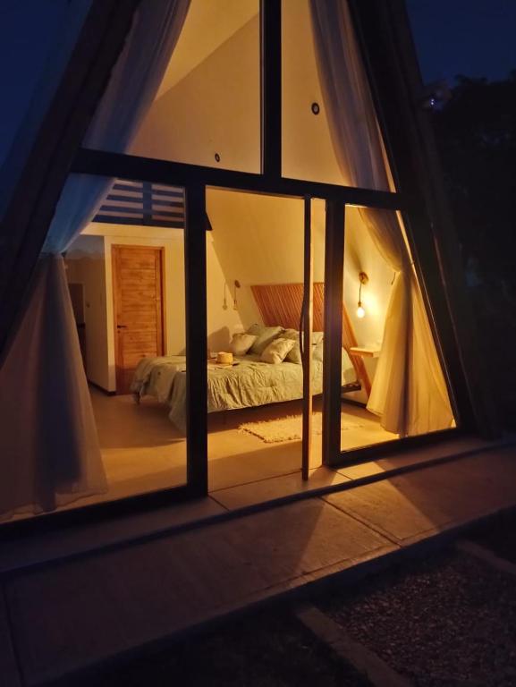 Postel nebo postele na pokoji v ubytování Andinas de Uco Lodge