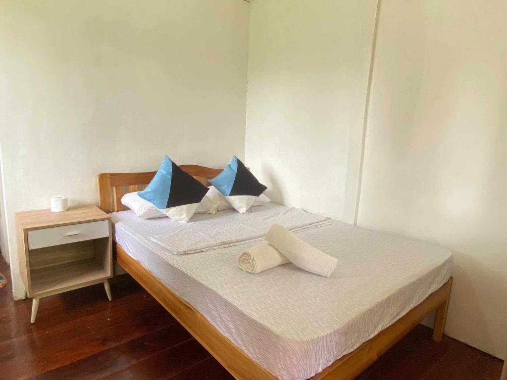 Postel nebo postele na pokoji v ubytování Mariah Guest House