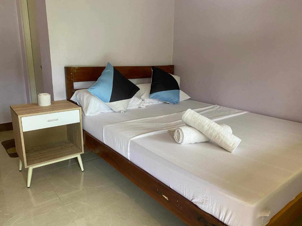 Postel nebo postele na pokoji v ubytování Mariah Guest House