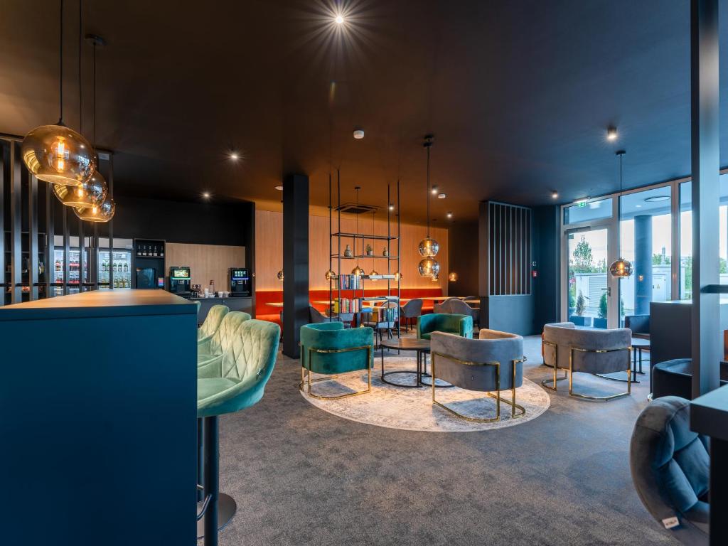 Posezení v ubytování JustStay München Hotel & Apartments