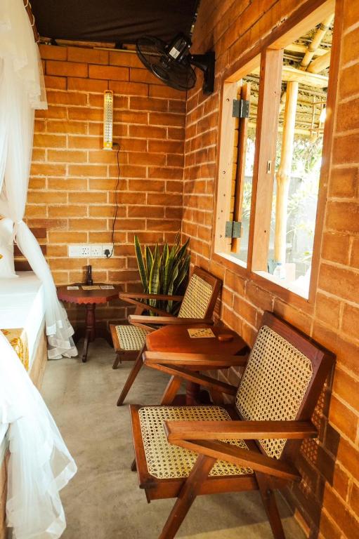 Posezení v ubytování Lunuvila Resort Hiriketiya Dikwella