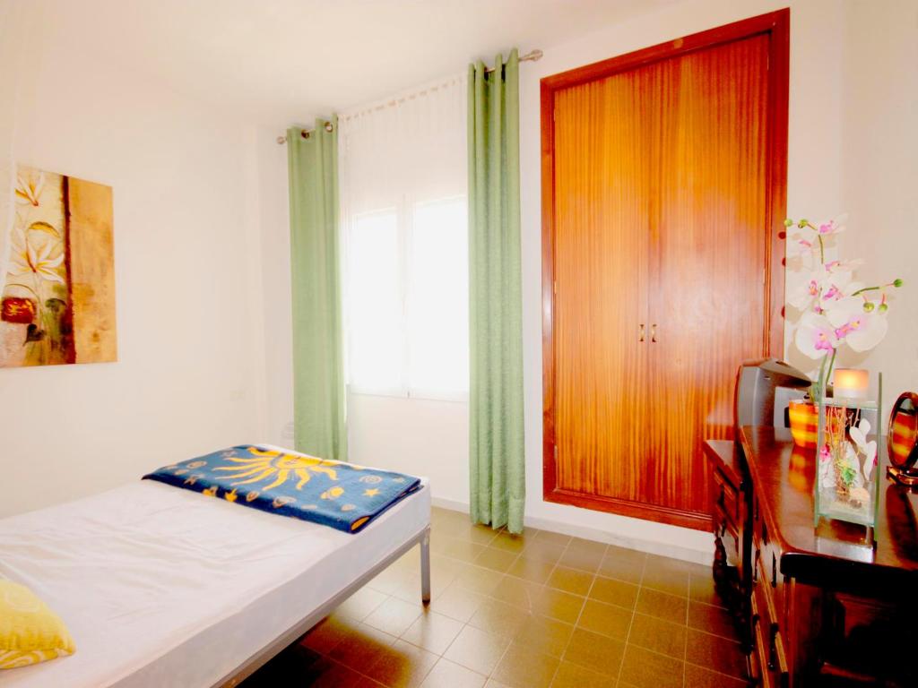 A bed or beds in a room at Apartment Montañar