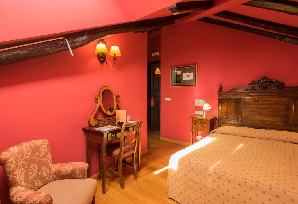Postel nebo postele na pokoji v ubytování Hotel La Posada Regia