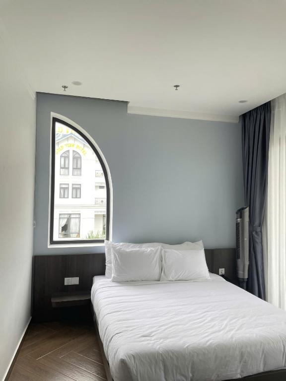 Postel nebo postele na pokoji v ubytování Sky View Memory Inn