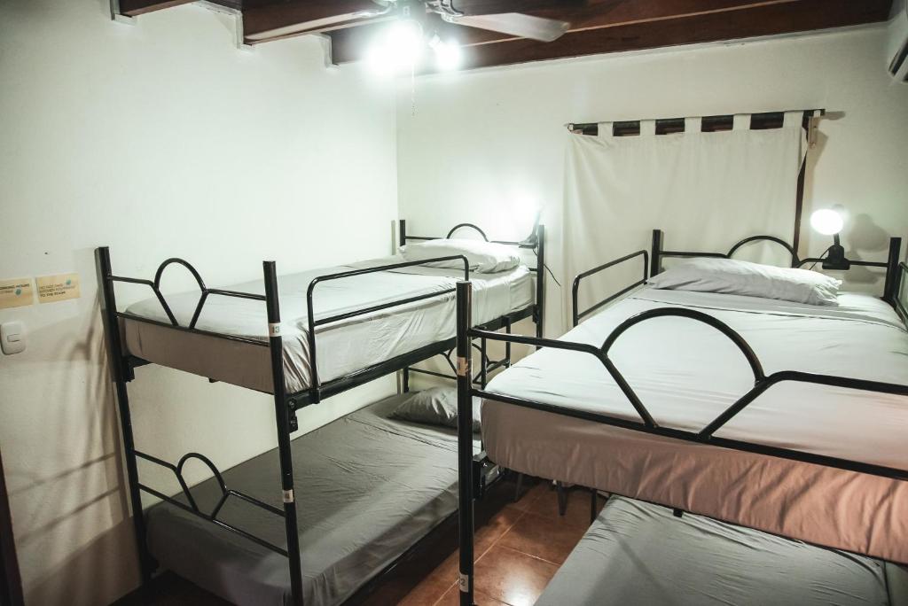 Postel nebo postele na pokoji v ubytování Mai Ke Kai Surf House